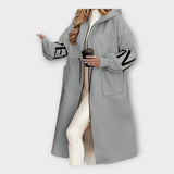 Κομψό Μακρύ Παλτό με Μοντέρνες Λεπτομέρειες